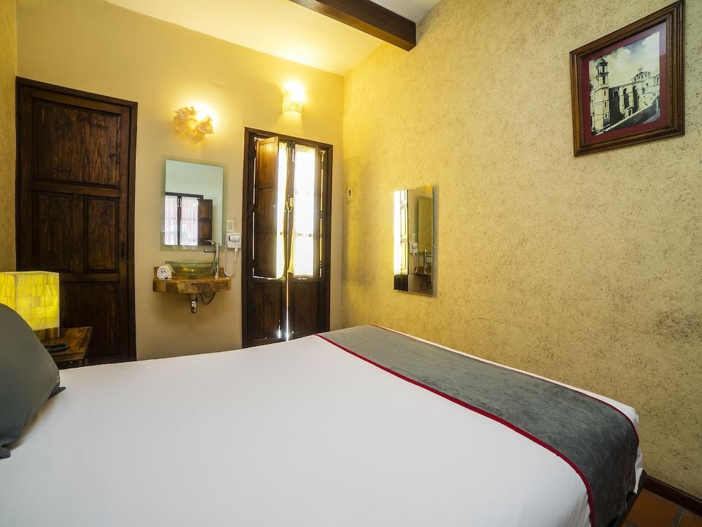 Collection O Al Otro Lado Del Rio, Puebla Hotell Exteriör bild A room at the hotel