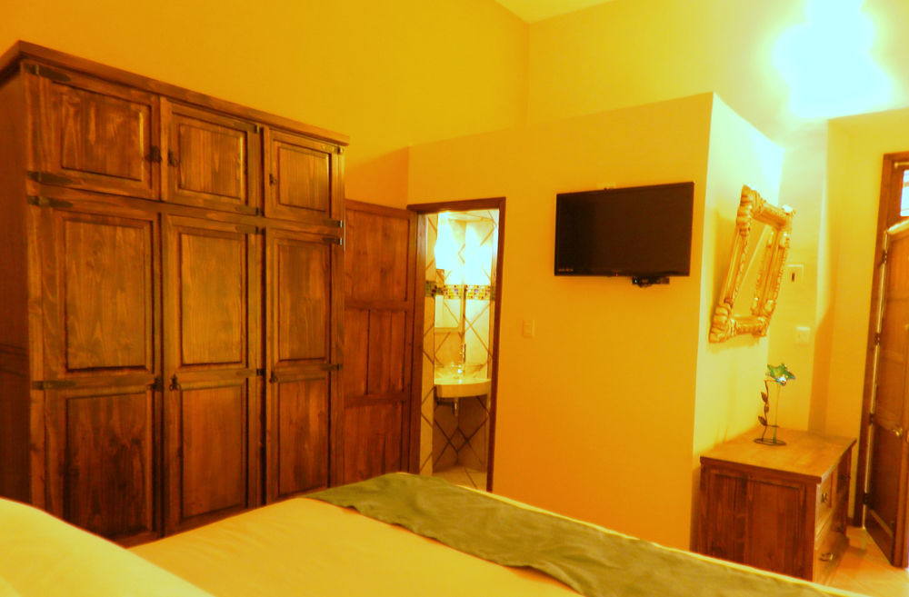 Collection O Al Otro Lado Del Rio, Puebla Hotell Exteriör bild A room at the hotel