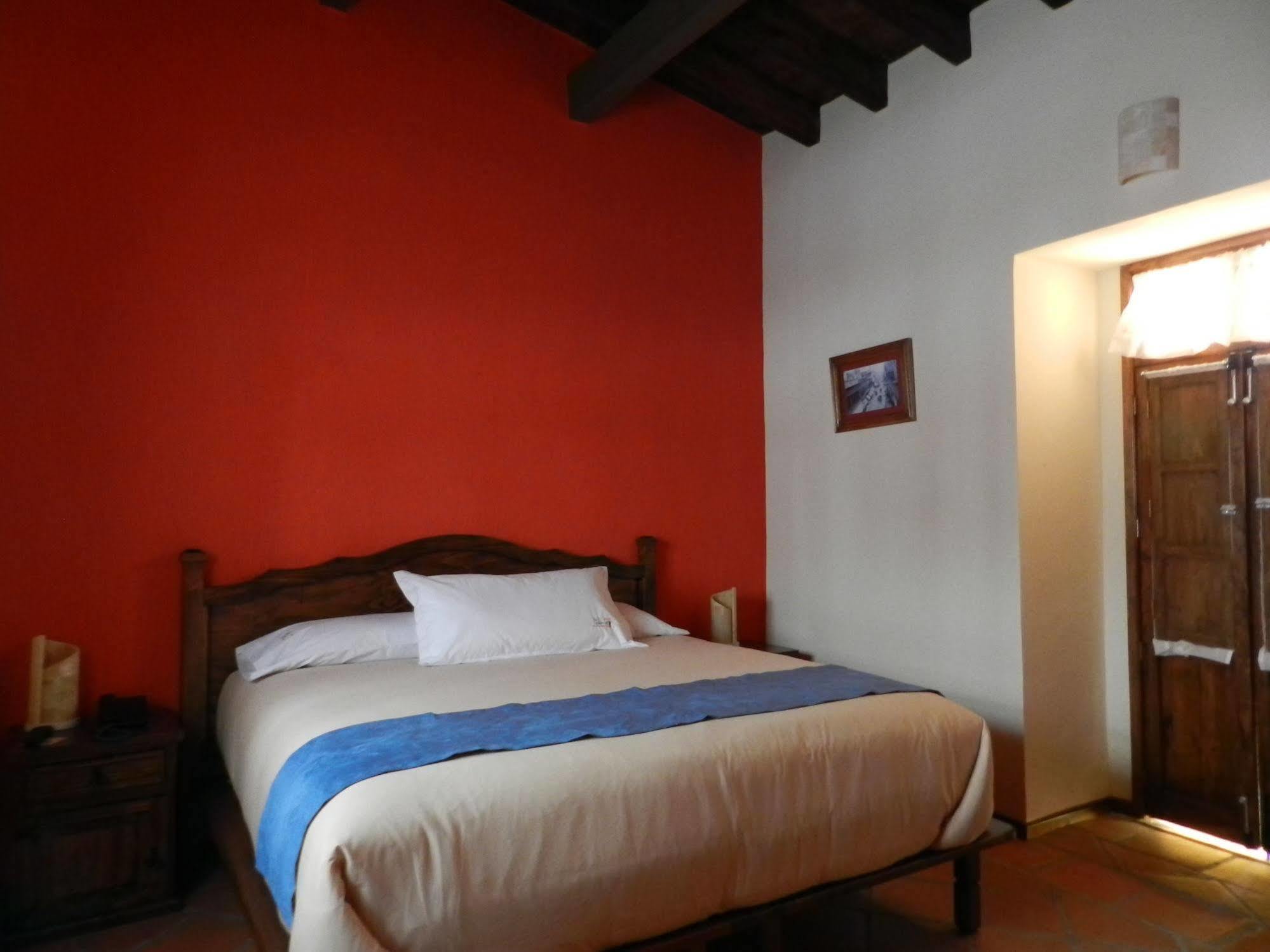 Collection O Al Otro Lado Del Rio, Puebla Hotell Exteriör bild A room at the hotel